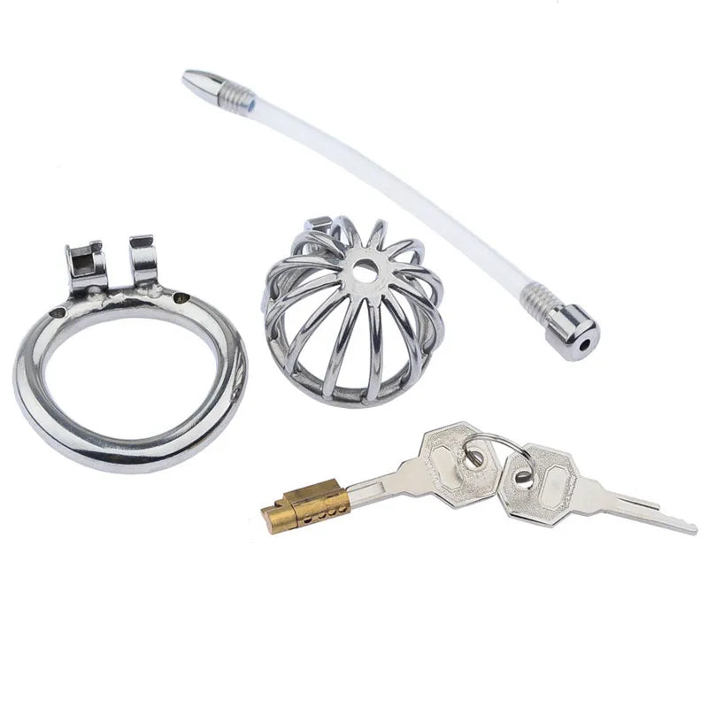Metal chastity with urethral tube and keys on a white background