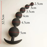 Black silicone Anal Beads with measurements on a white background