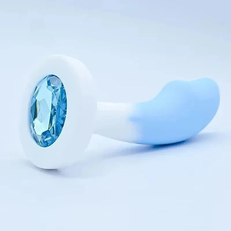 Light blue  Long Curved with a prominent gemstone on a light gray background