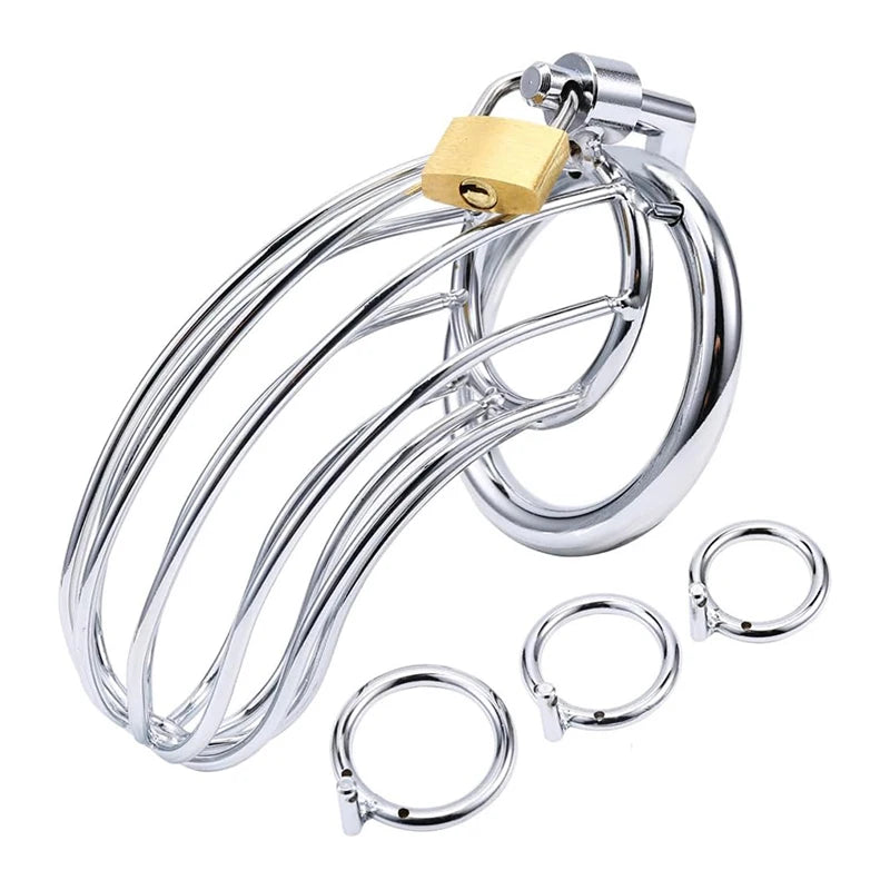 Clear chastity cage with gold lock and additional rings on a white background