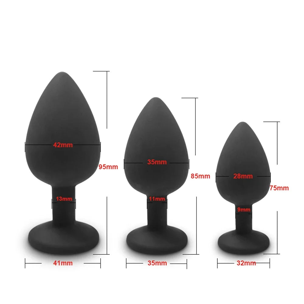 Three black silicone butt plugs with measurements on a white background