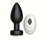 Black Wireless Anal Vibrator Butt Plug and white controller on a white background
