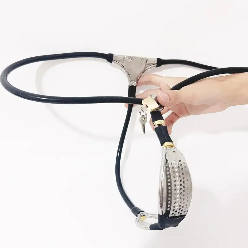 Black female chastity belt with stainless steel front plate, adjustable straps, and secure lock with keys