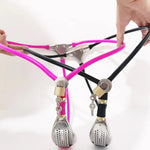 Black and pink female chastity belts with stainless steel plates, adjustable straps, and secure locks with keys
