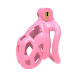 Nano Pink chastity cage with a gold lock on a white background