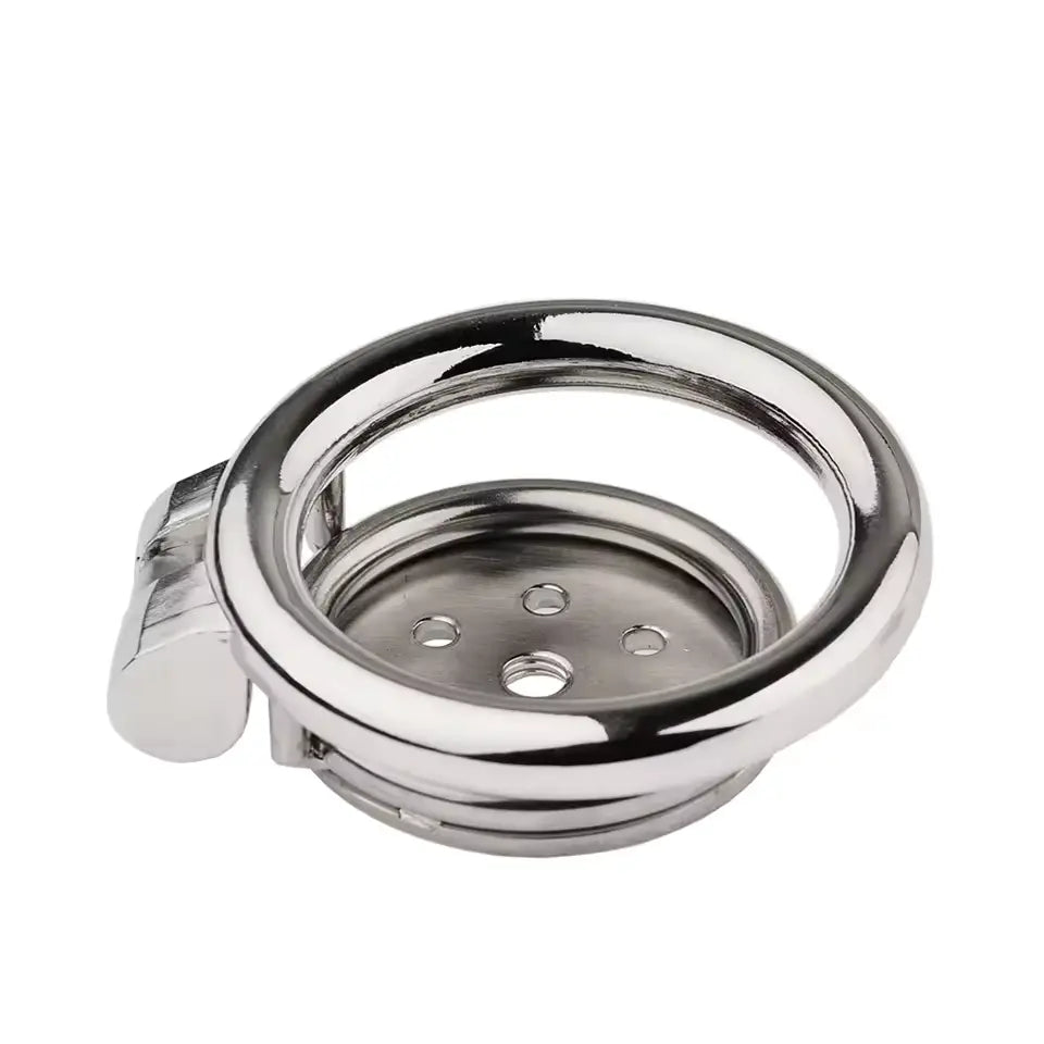 Chrome metal ring with central circular component on a white background