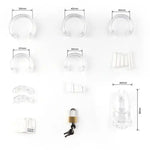 Measurement chart of various small components and a clear chastity cage on a white background