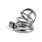 Close-up view of metal chastity cage with secure lock and ring design