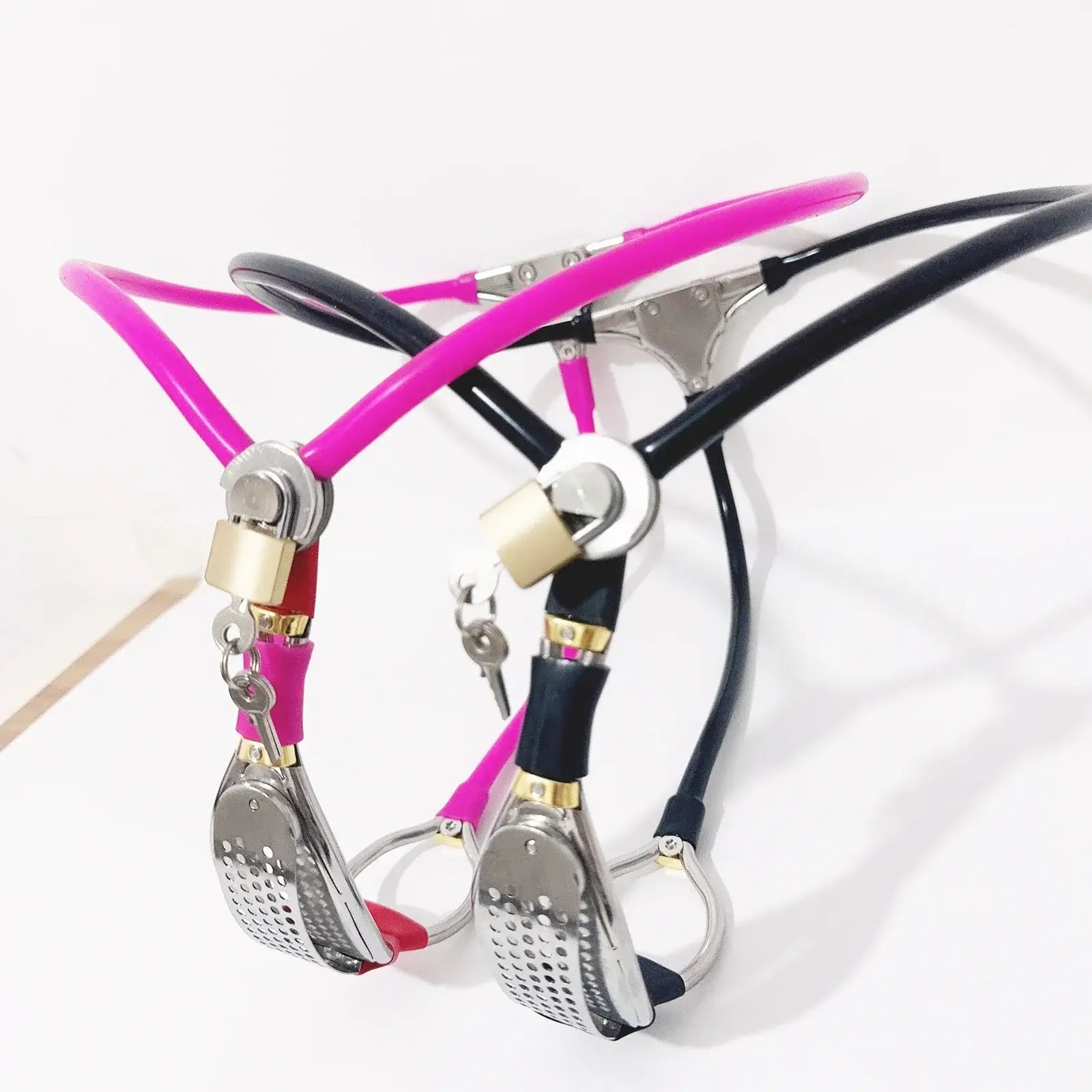 Pink and black female chastity belts with stainless steel plates, adjustable straps, and secure locks