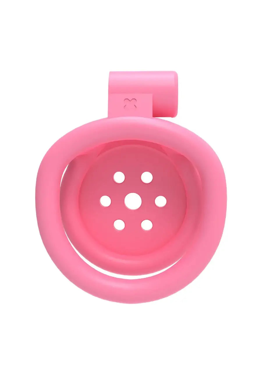 Pink flat chastity cage showing ring and ventilation holes for comfort